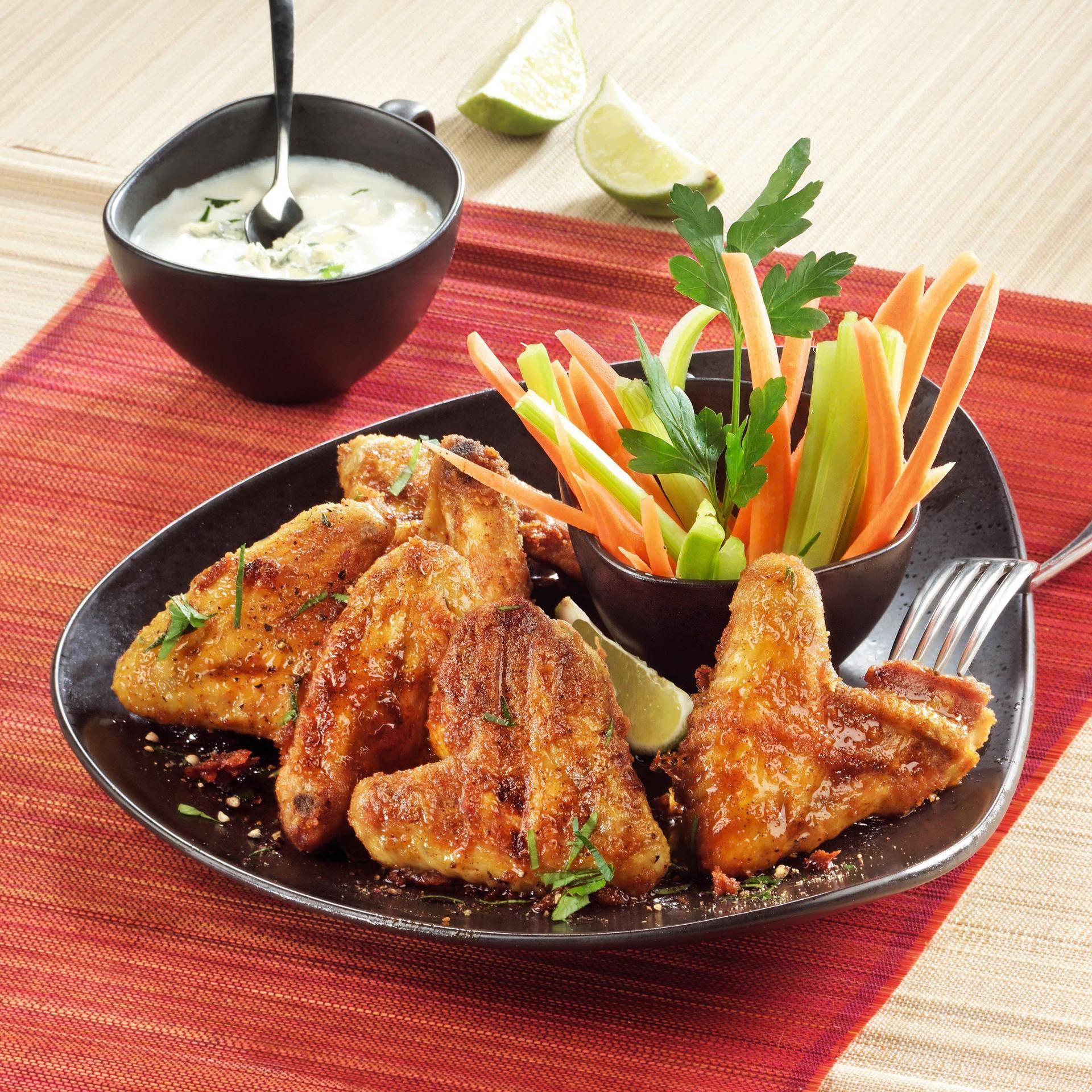Alette di pollo alla griglia con salsa buffalo - Ricette undefined | Moulinex